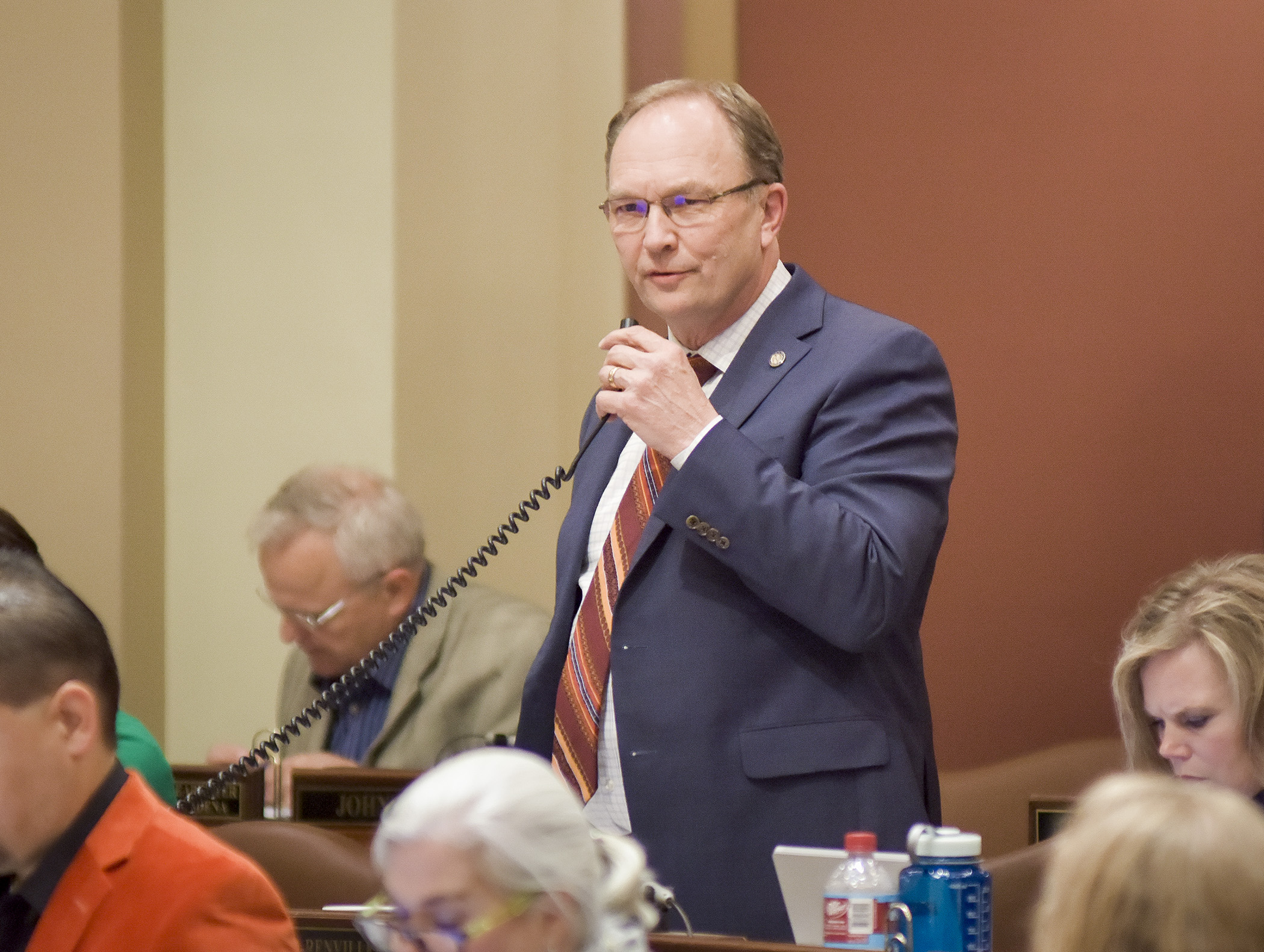 Rep. Paul Torkelson presents the omnibus transportation finance bill on the House Floor May 24. Photo by Andrew VonBank